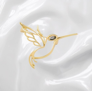 Broche élégante en forme d'oiseau ajouré avec plumes dorées et œil en pierre noiregance musical  (1)