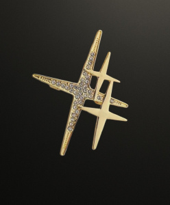 Broche neuve en forme de croix avec des strass